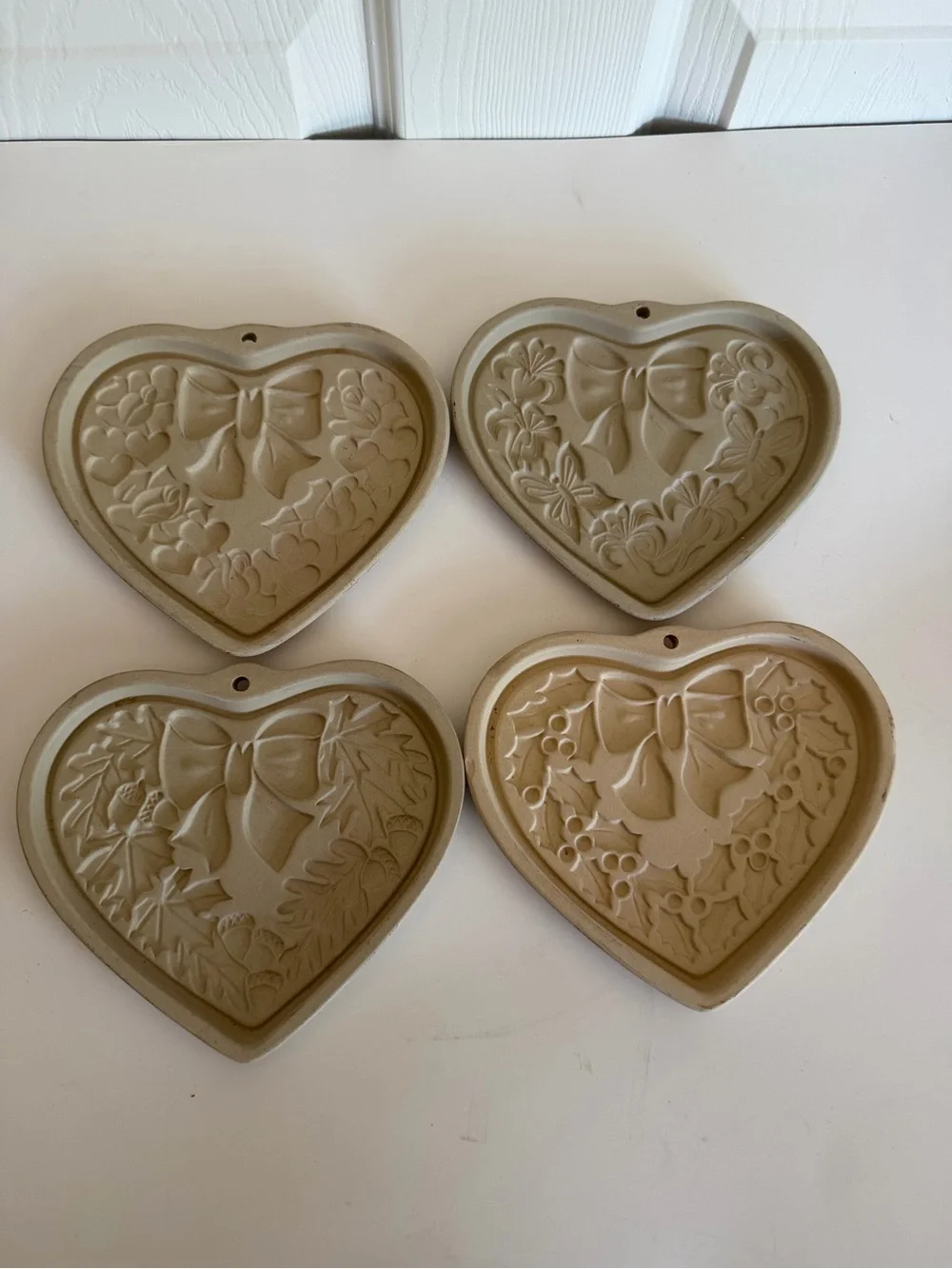 Pampered Chef “Seasons of the Heart” heart shaped stoneware cookie mold. Read
